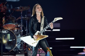 Lzzy Hale has certainly become a sex symbol in the rock community & one can easily see why.  But that isn't why she's famous.  She's famous b/c she is an insanely talented singer & guitarist . . . who just happens to be pretty hot too. :)
